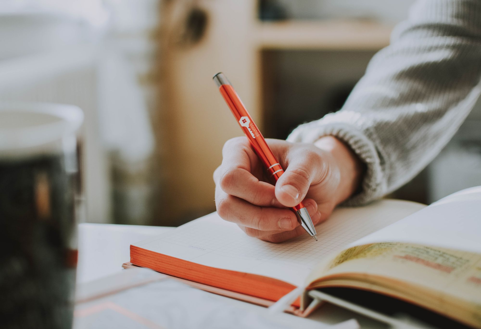 NEED CONTENT hand holding custom printed pen